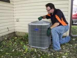 Man working on air conditioner